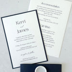 Navy wedding invite with belly band and white blank wax seal