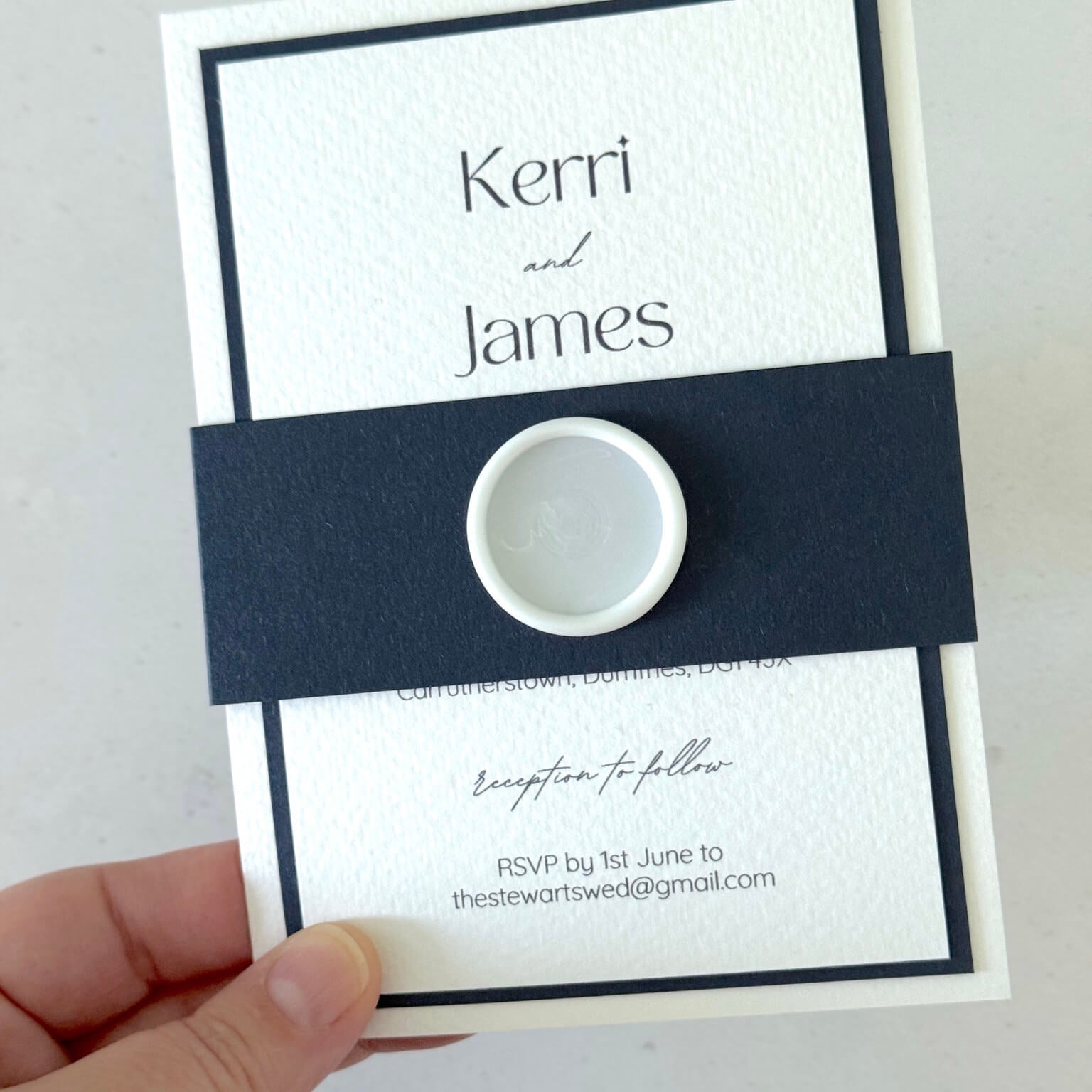 navy and white postcard wedding invite and details card with belly band and wax seal 