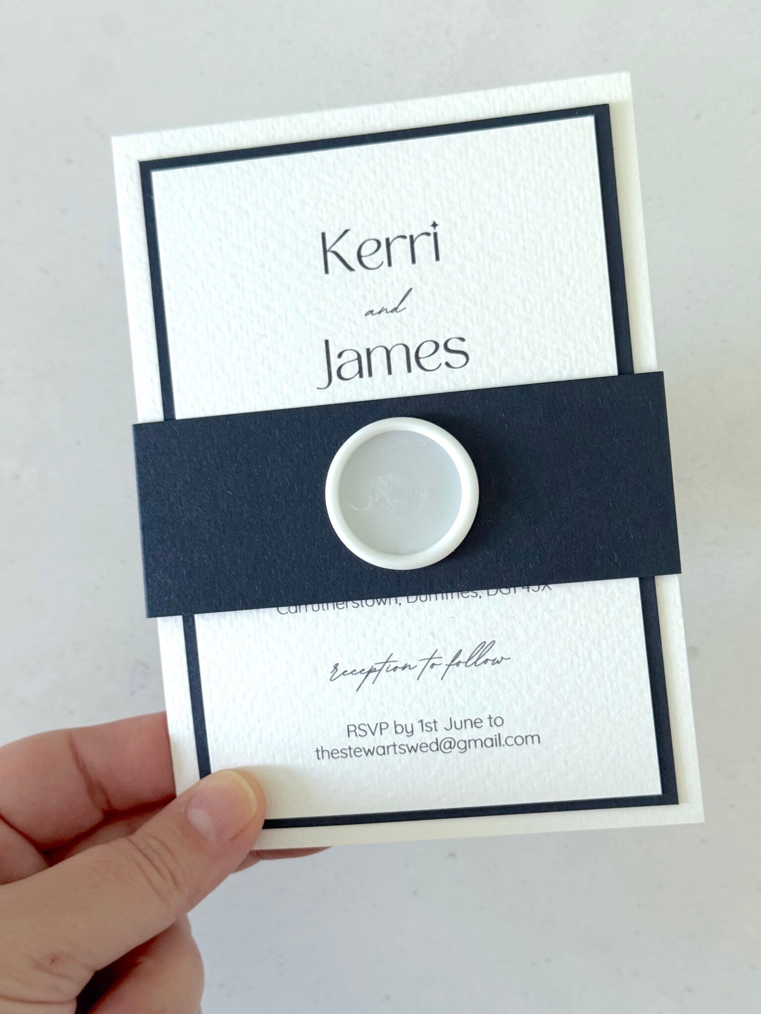 navy and white postcard wedding invite and details card with belly band and wax seal 