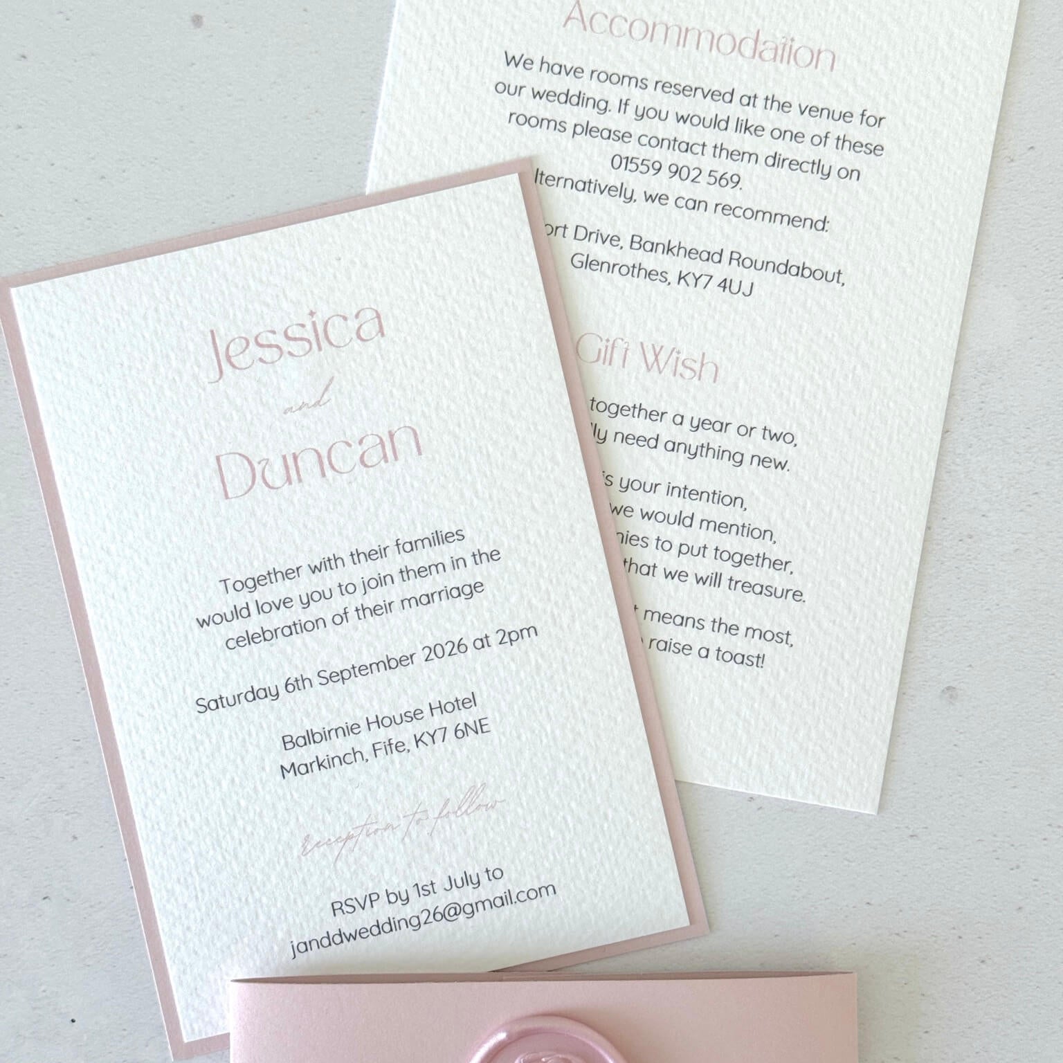 Blush pink invite with wedding details postcard and belly band with handmade wax seal