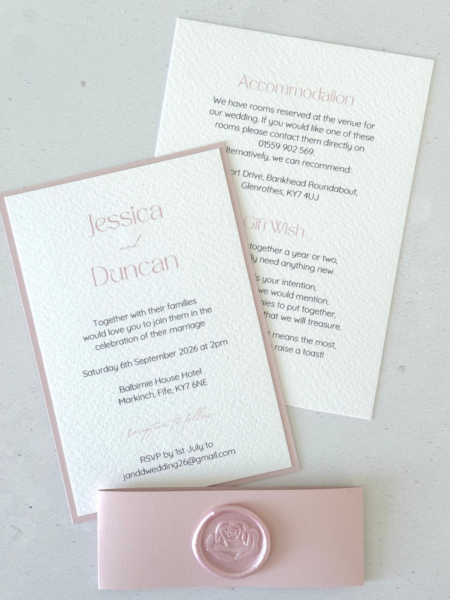 Blush pink invite with wedding details postcard and belly band with handmade wax seal