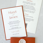 Lyn postcard wedding invite with rust orange belly band and white rose wax seal
