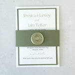 Layered wedding invite and info postcard with belly band and sage green wreath wax seal