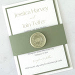 sage green and white layered wedding invite with wax seal belly band 