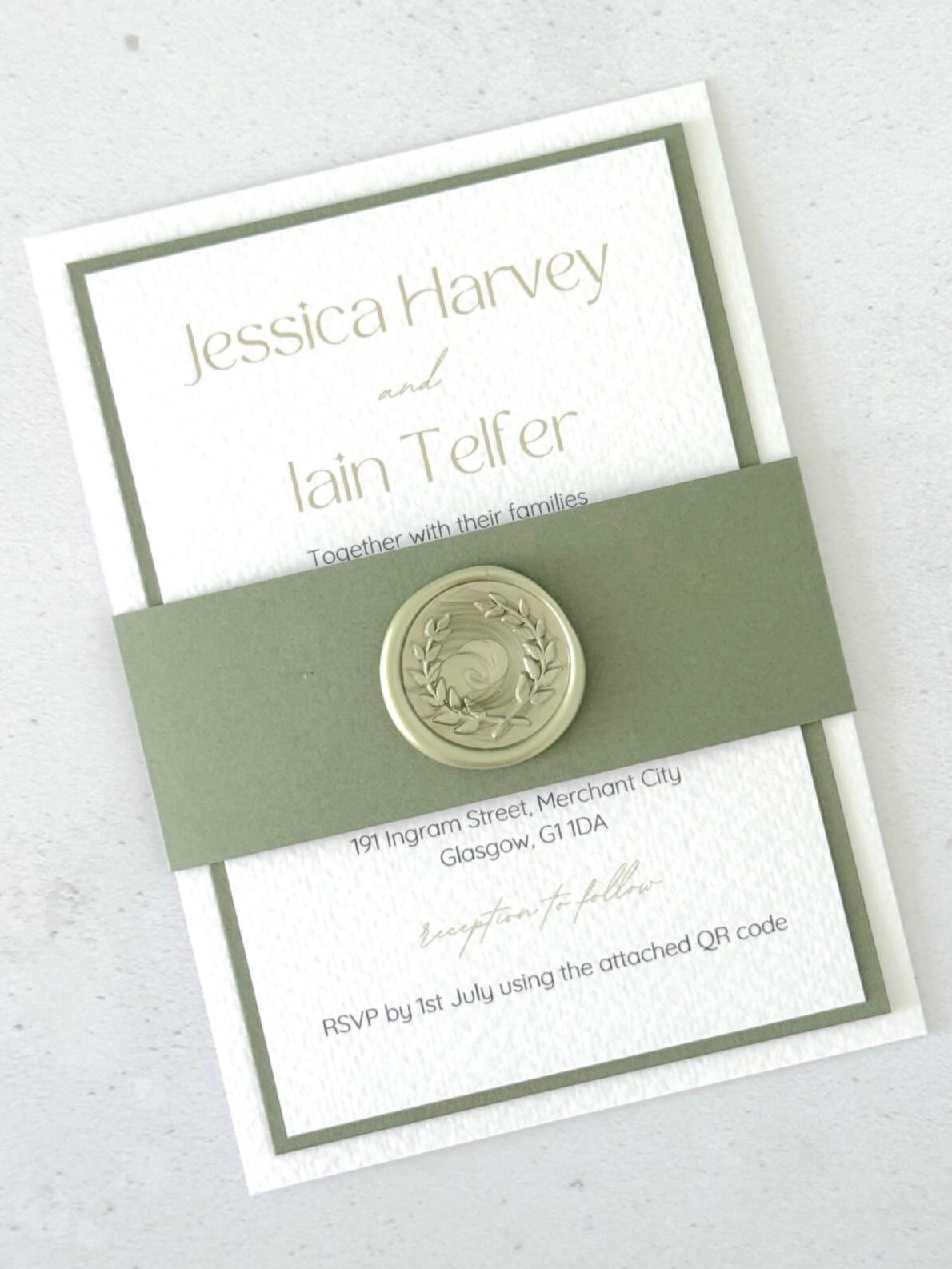 sage green and white layered wedding invite with wax seal belly band 