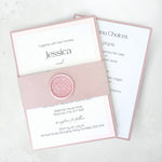 Dusky pink belly band wedding invite and details card with handmade foliage wax seal