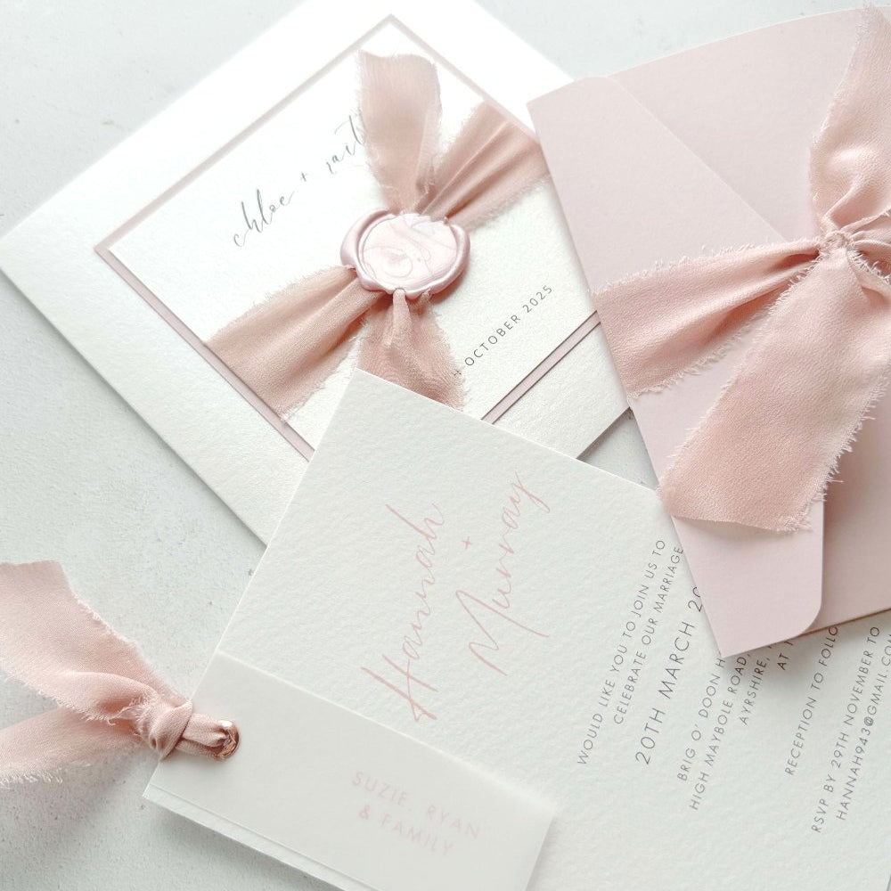 Pink silk ribbon and wax seal wedding invites by handmade by zara