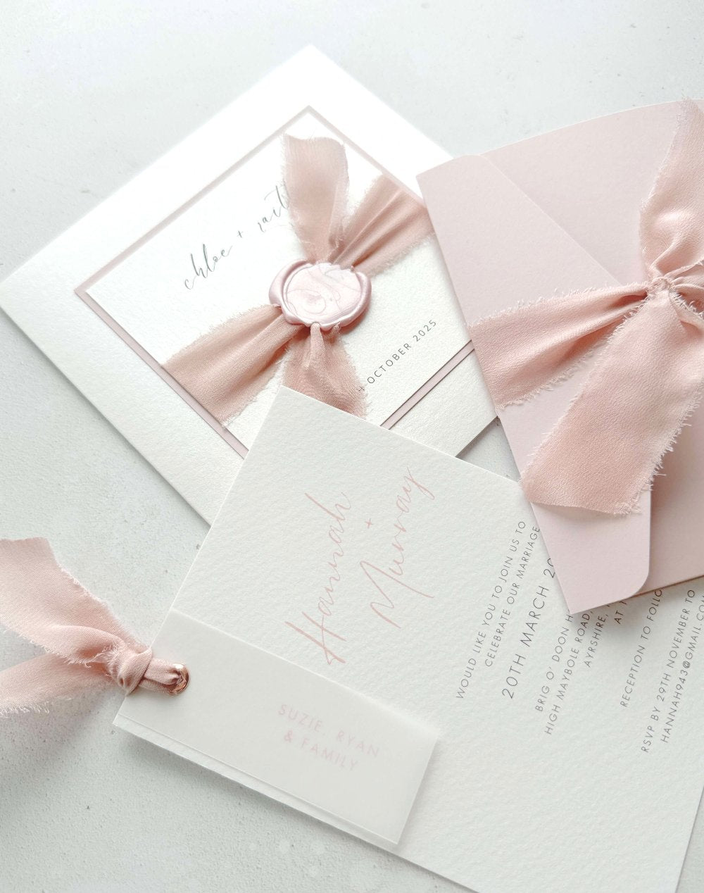 Pink silk ribbon and wax seal wedding invites by handmade by zara