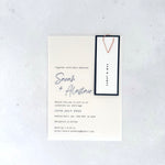 handmade see through vellum wedding invite in navy. 