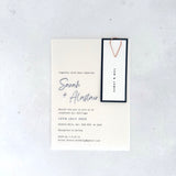 handmade see through vellum wedding invite in navy. 