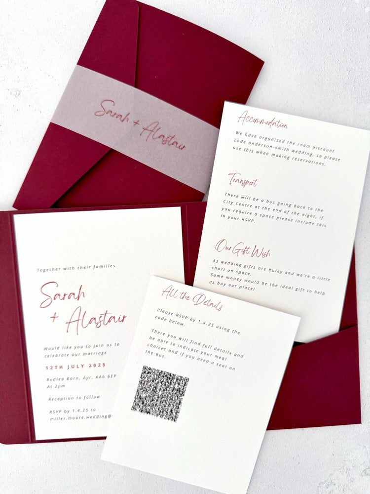 Sarah burgundy pocketfold wedding invite with 2 insert cards for menu and guest details, and QR code, with vellum belly band, handmade by zara scotland
