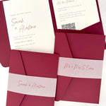 Sarah Pocketfold wedding invites with personalised handmade vellum belly bands in burgundy