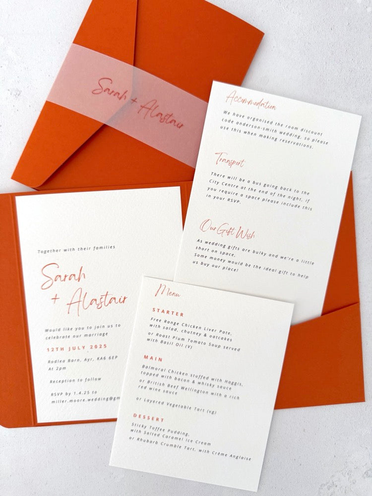 Sarah pocketfold wedding invite with 2 insert cards for menu and guest details, in burnt orange, with vellum belly band, handmade by zara scotland
