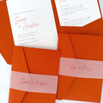 Sarah Pocketfold wedding invites with personalised vellum belly bands in burnt orange