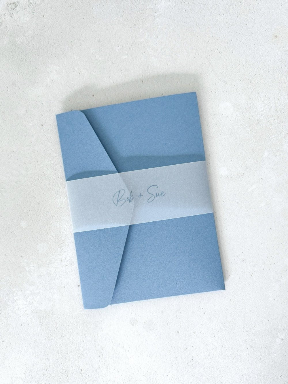 Sarah dusky blue pocketfold wedding invitation with printed belly band