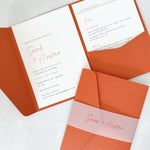 pocketfold wedding invite with 2 insert cards for menu and guest details, in burnt orange, with vellum belly band, handmade by zara scotland