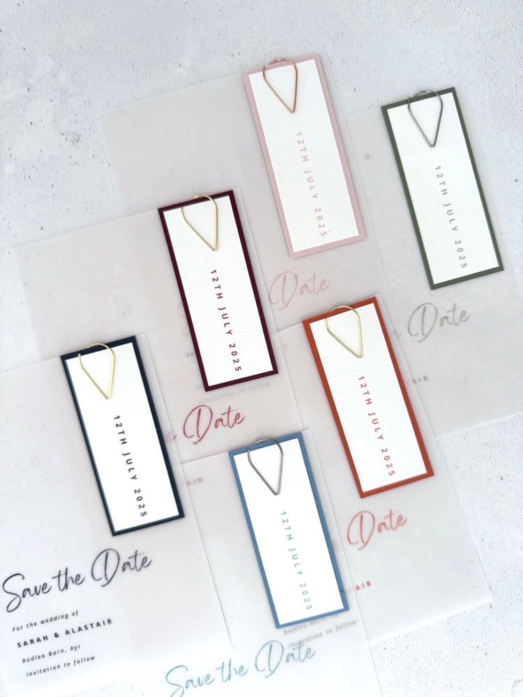 Save the date cards for wedding announcement with transparent vellum and coloured date tags with paperclips