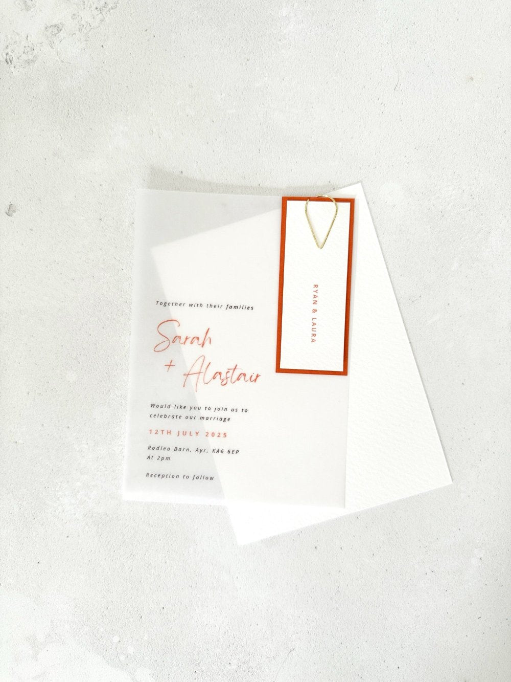 Sarah transparent wedding invite and paperclip handmade by zara dumfries 