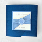 Navy and dusky blue pocketfold wedding invite with ribbon and wax seal luxury wedding stationery scotland