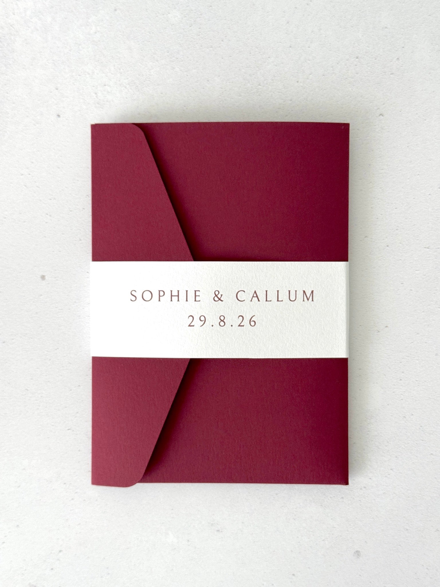 burgundy red personalised with couples names and wedding date on white belly band