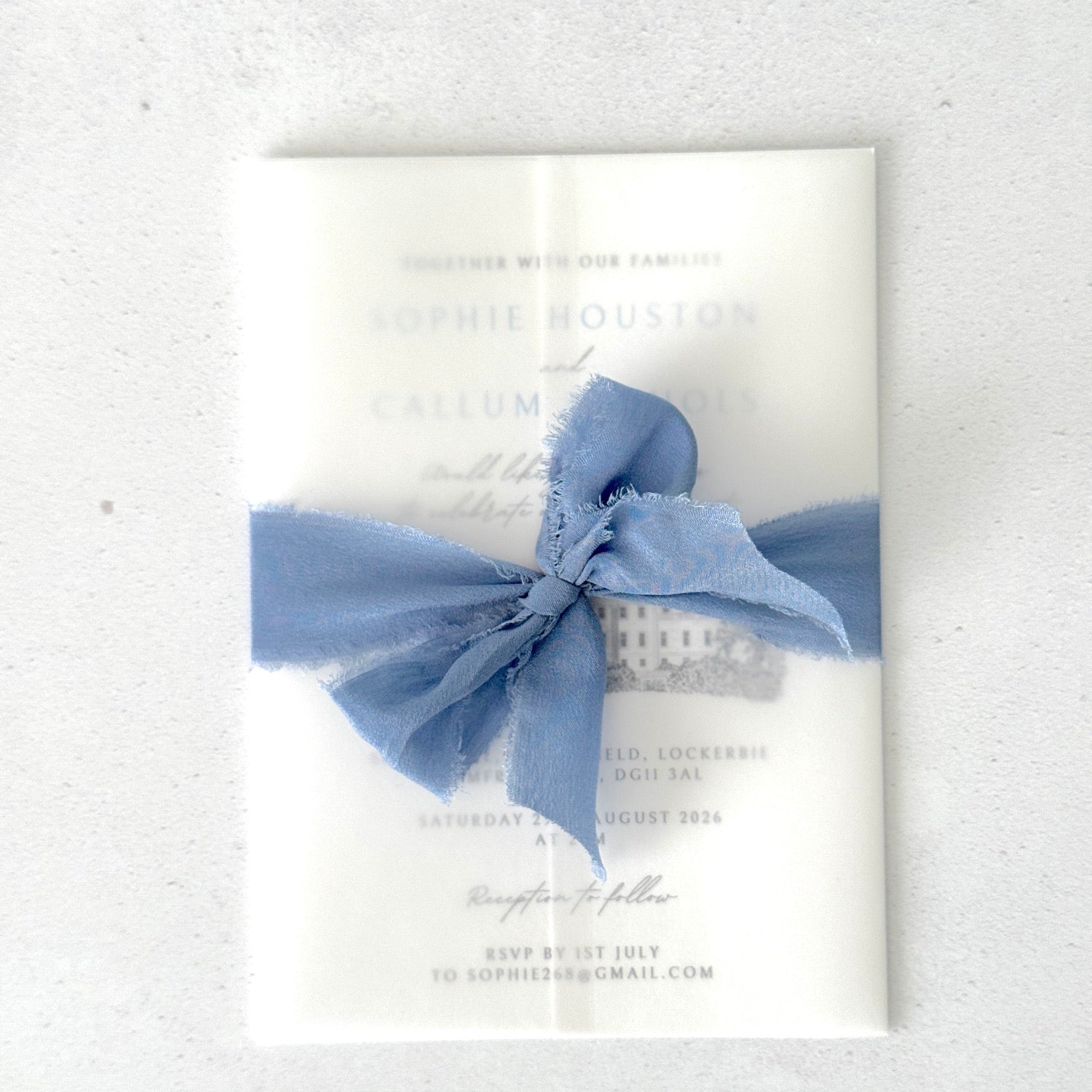 venue illustration wedding invite with see through paper vellum jacket and silk tied ribbon 