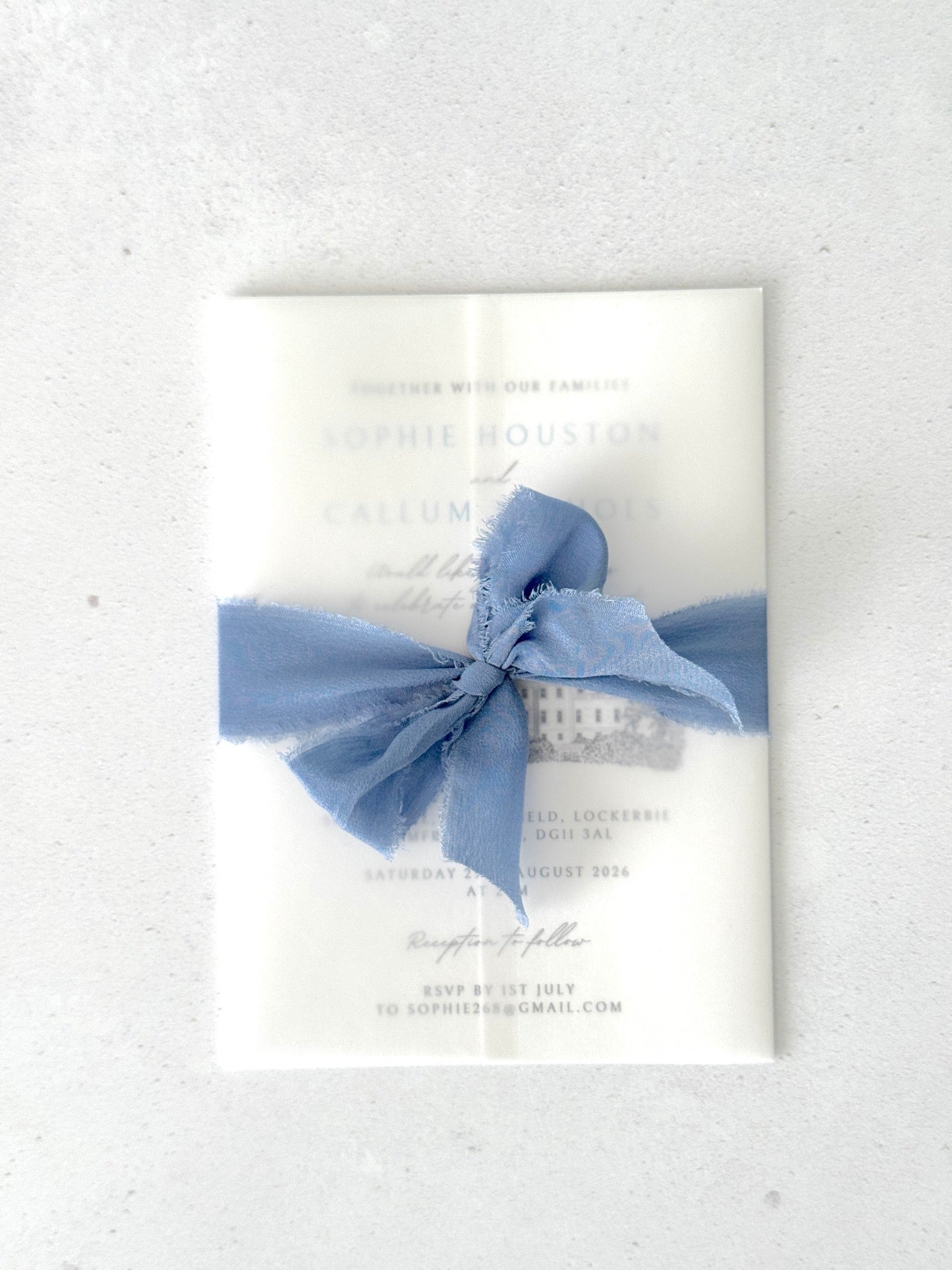 venue illustration wedding invite with see through paper vellum jacket and silk tied ribbon 