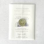finishing touch for GG's Yard venue illustration wedding invite with vellum wrap and sage green wax seal
