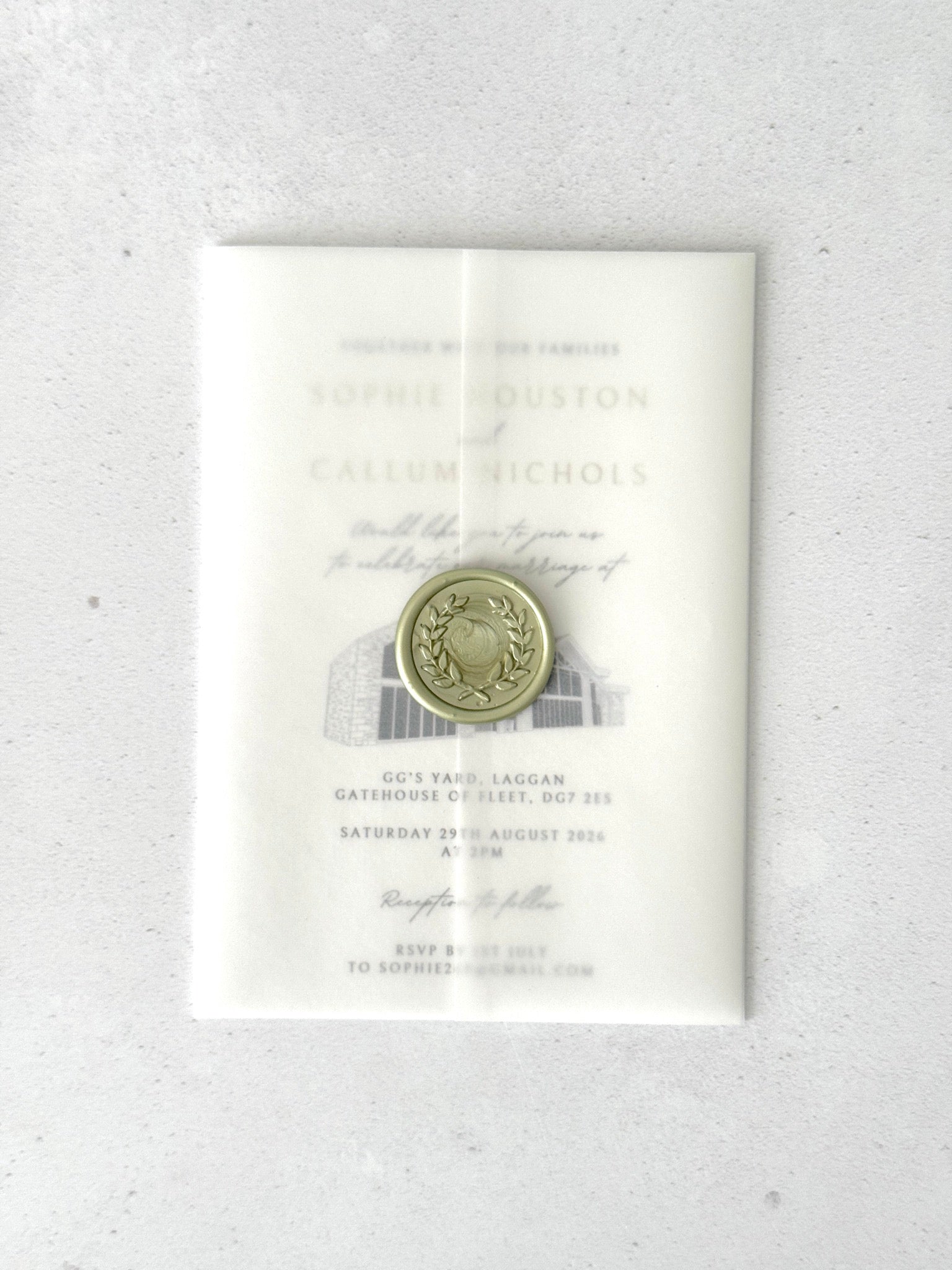finishing touch for GG's Yard venue illustration wedding invite with vellum wrap and sage green wax seal