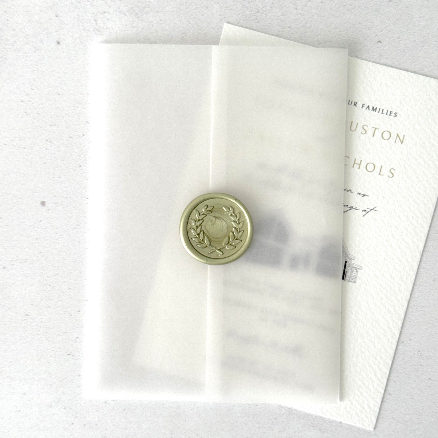 finishing touch for wedding invite with vellum jacket and handmade wax seal