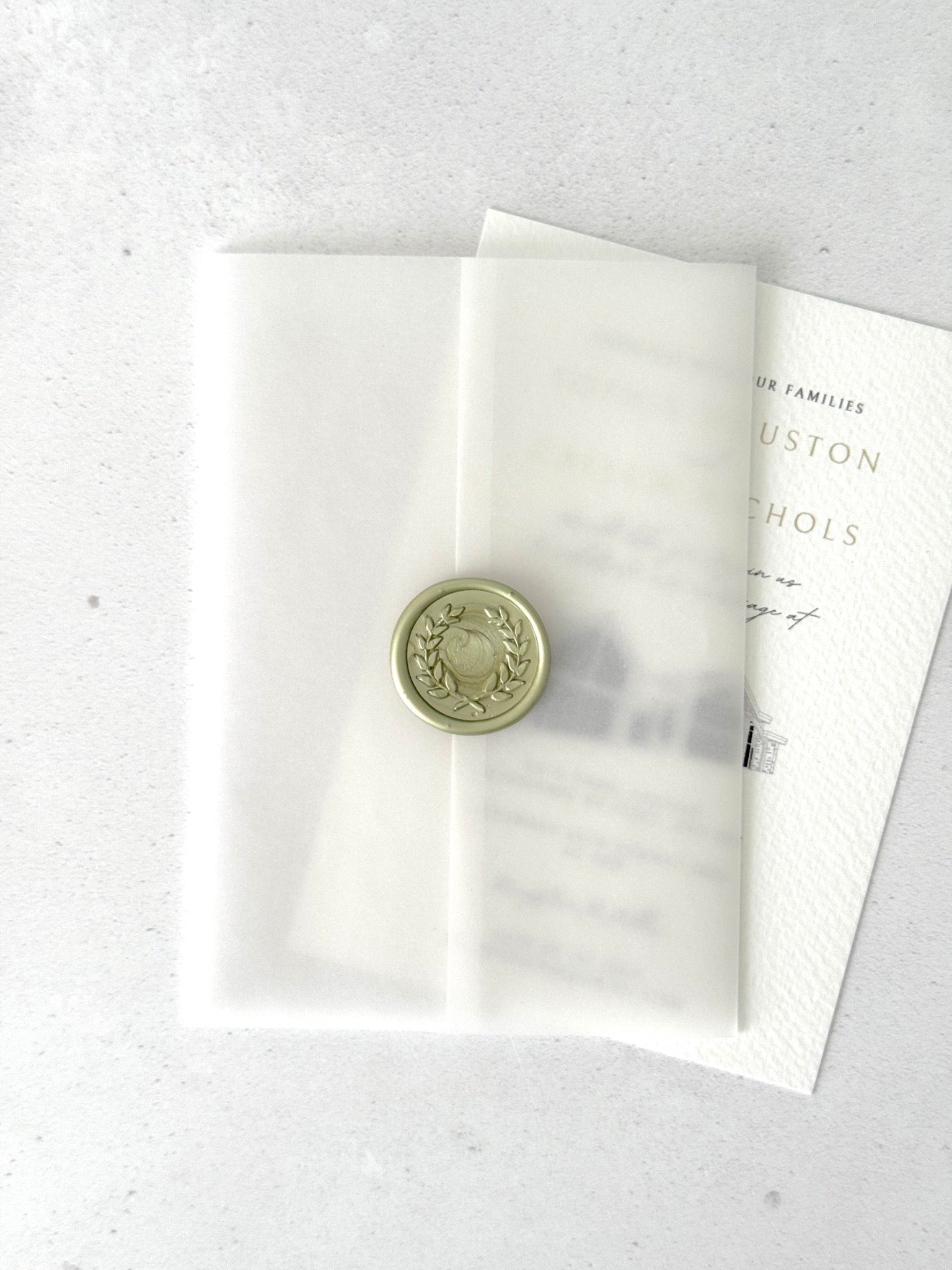 finishing touch for wedding invite with vellum jacket and handmade wax seal