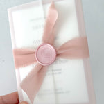 Blush Pink silk ribbon and wax sealed vellum wedding invite