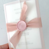 Blush Pink silk ribbon and wax sealed vellum wedding invite