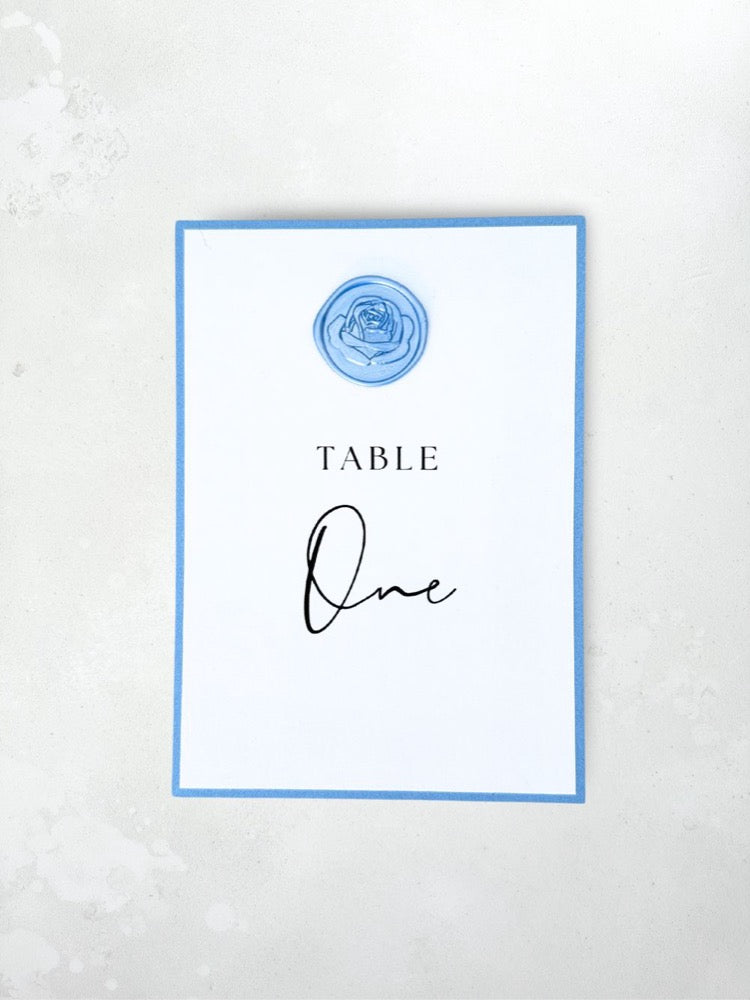 dusty blue rose wax seal table name on the day wedding stationery handmade by zara Dumfries