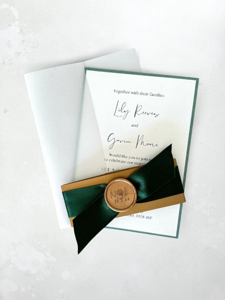 Emerald green satin ribbon with gold wax seal vellum jacket wedding invite handmade by zara dumfries