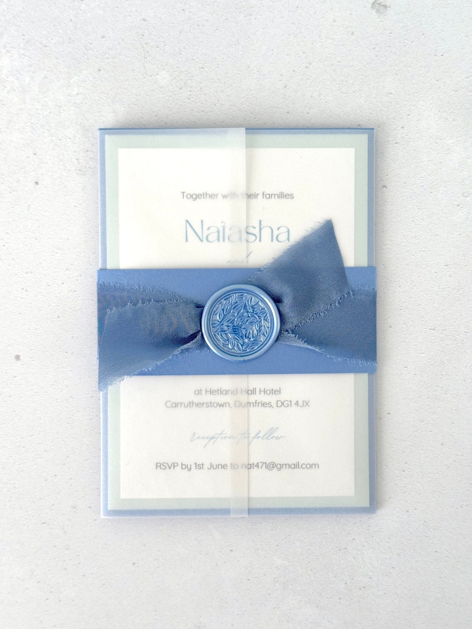 see through paper jacket wedding invite with belly band and handmade wax seal