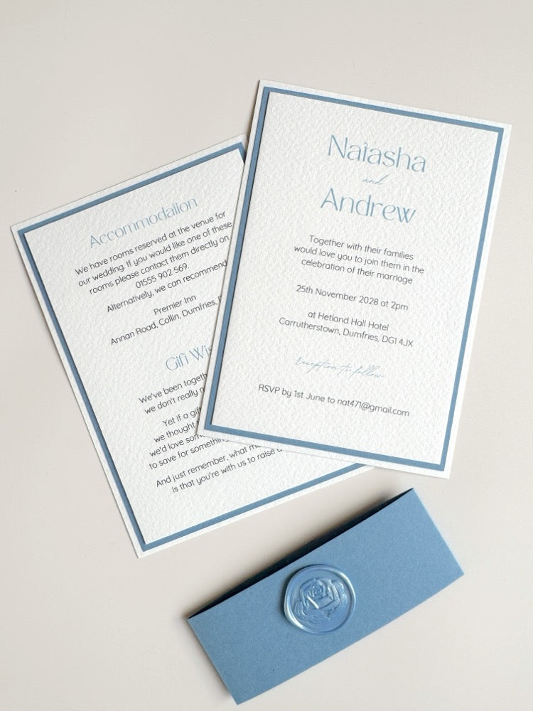dusty cornflower blue postcard wedding invite and details card with belly band and handmade rose wax seal