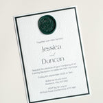 Lyn evening wedding invite in white and forest green with dark green foliage handmade wax seal