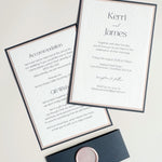 Navy and pink wedding invite with belly navy band and pink blank wax seal. Info card with accommodation and gift wish details.