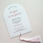 Megan arch style wedding invite with pink tassel