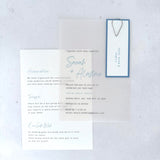 Sarah transparent vellum wedding invite with sage green name tag and teardrop paperclip and details card for gift wishes