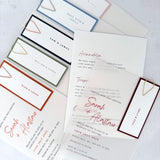 Handmade see through vellum wedding invites with coloured tags and teardrop paperclip in 6 colours