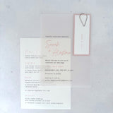 Sarah transparent vellum wedding invite with blush pink name tag and teardrop paperclip and details card for menu options