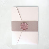 zoe dusky pink belly band wax seal wedding invitation handmade by zara