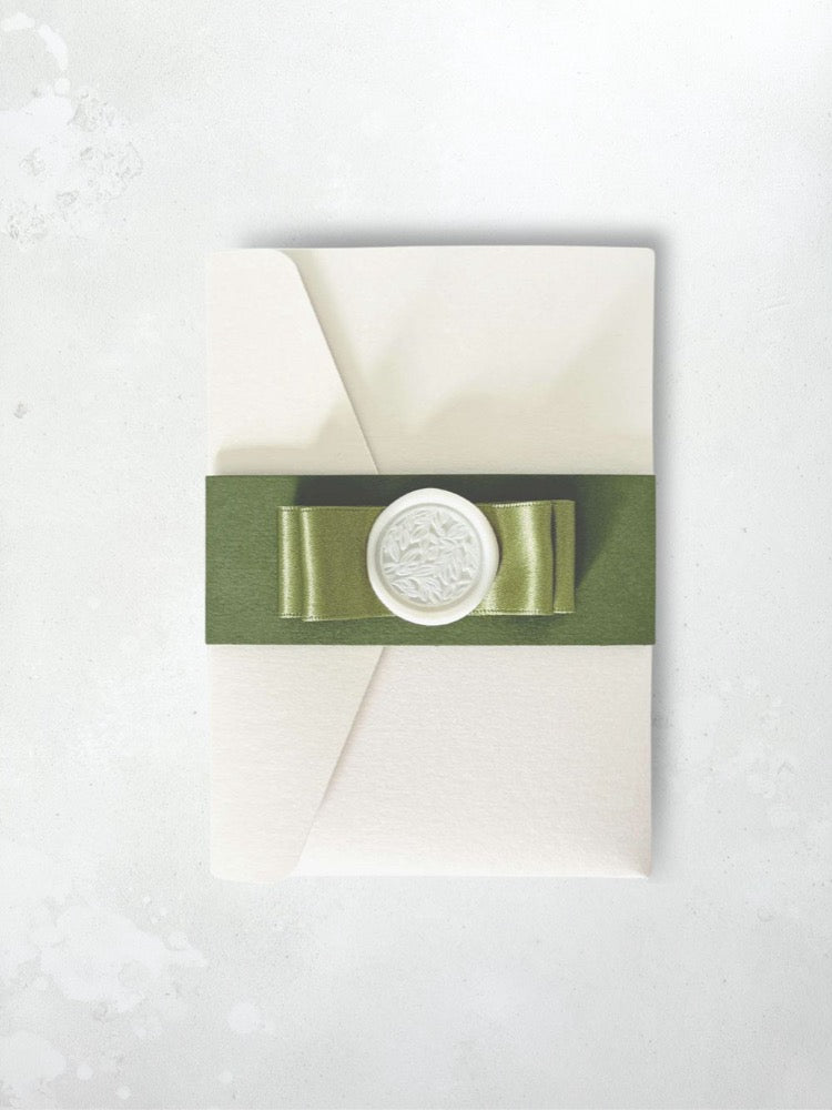 zoe sage green satin double bow and wax seal pocketfold wedding invite with belly band